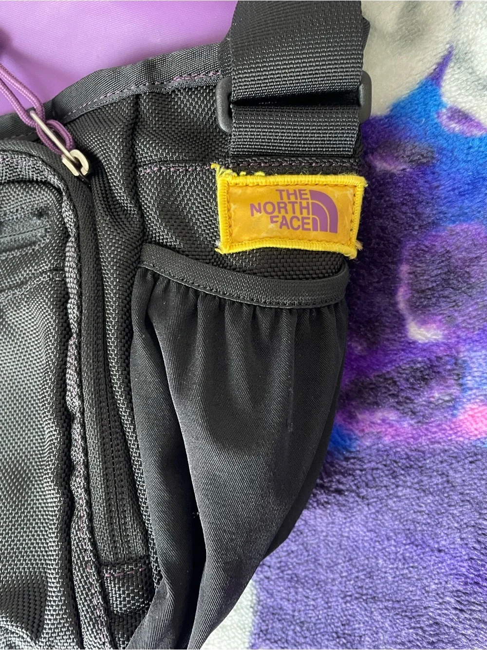 The North Face Black Messenger Bag with Yellow Accents
